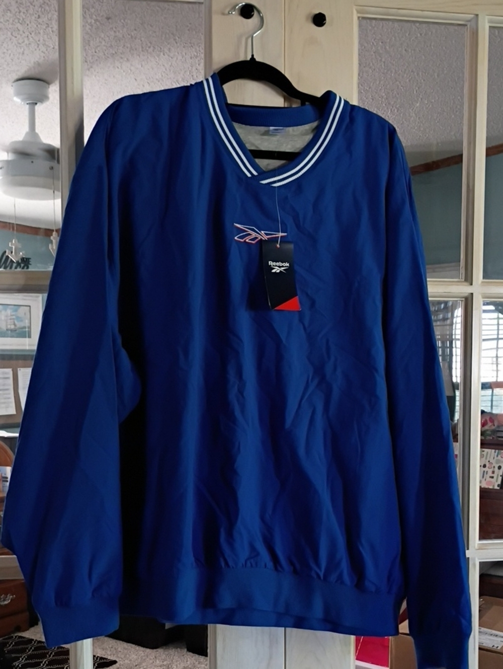 Reebok Blue V‑Neck Pullover with White Trim